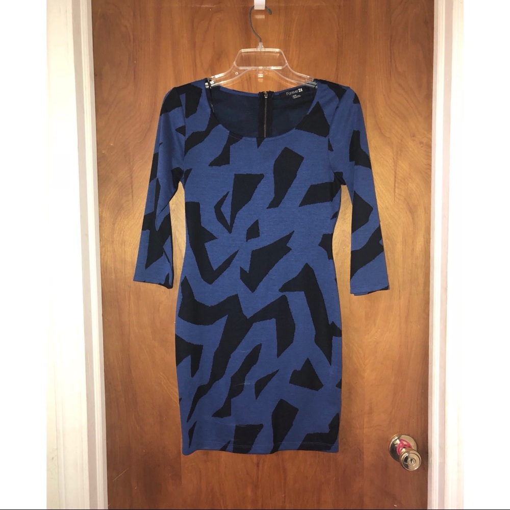 Back & blue patterned dress. - Picture 1 of 2